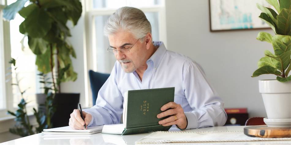 Man engaging in scripture