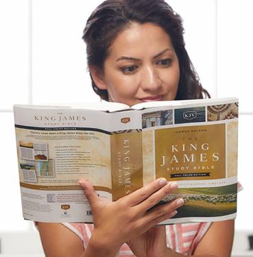 Woman reading the KJV The King James Study Bible