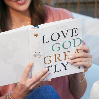 Woman reading NET Love God Greatly Bible