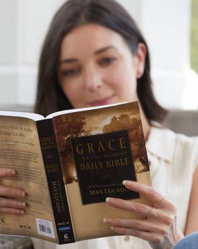 woman reading NCV Grace for the Moment Daily Bible